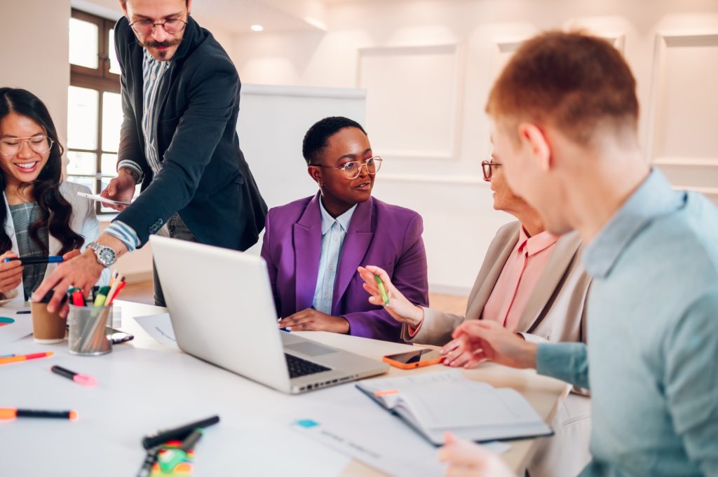 Multiracial business group of people having a meeting in an office