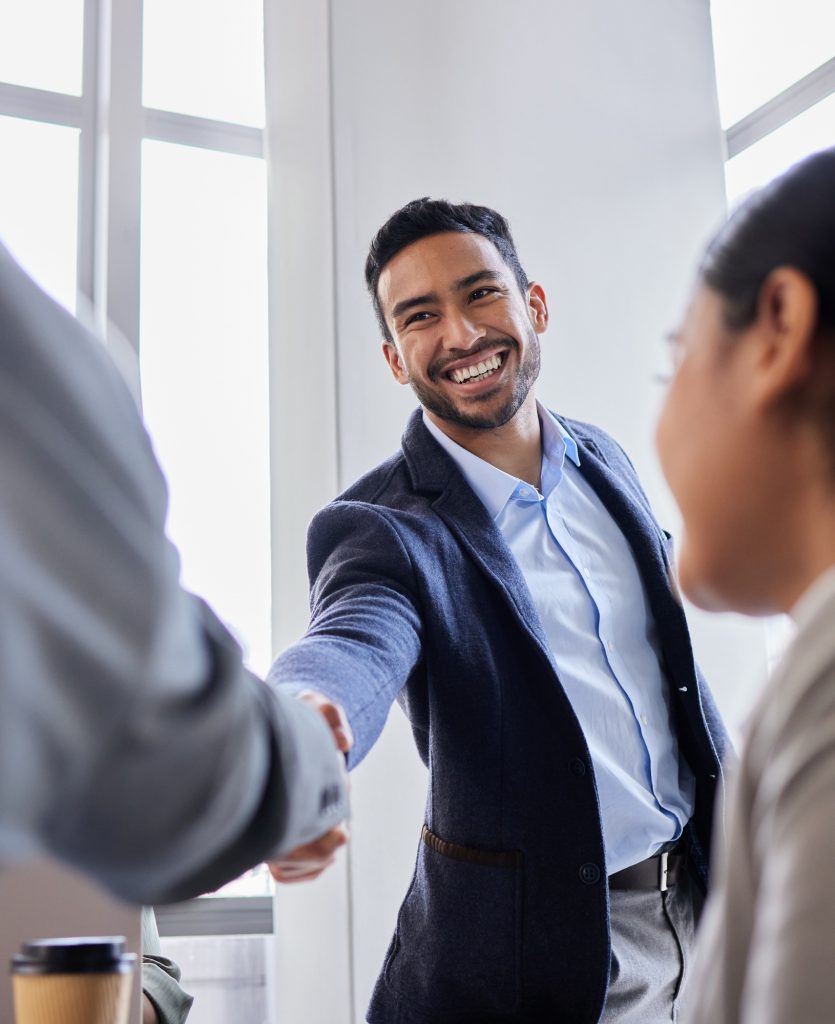 Pleased to meet you. Shot of two business people shaking hands during a meeting.